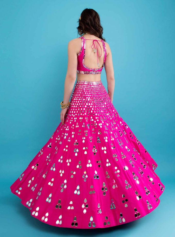 Fuschia lehenga with falling drops