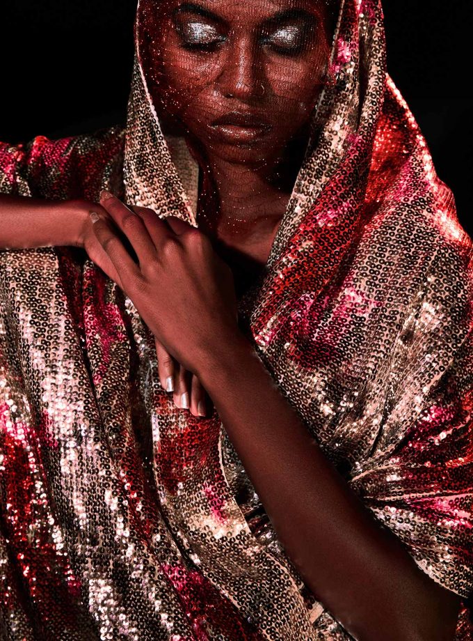 Rosegold sequin sheeted sari with texture printing on sequin in maroon