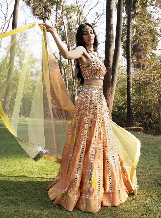 Orange and yellow Raw Silk Hand Tie- Dye Printed & Mirror Embroidered Lehenga Set